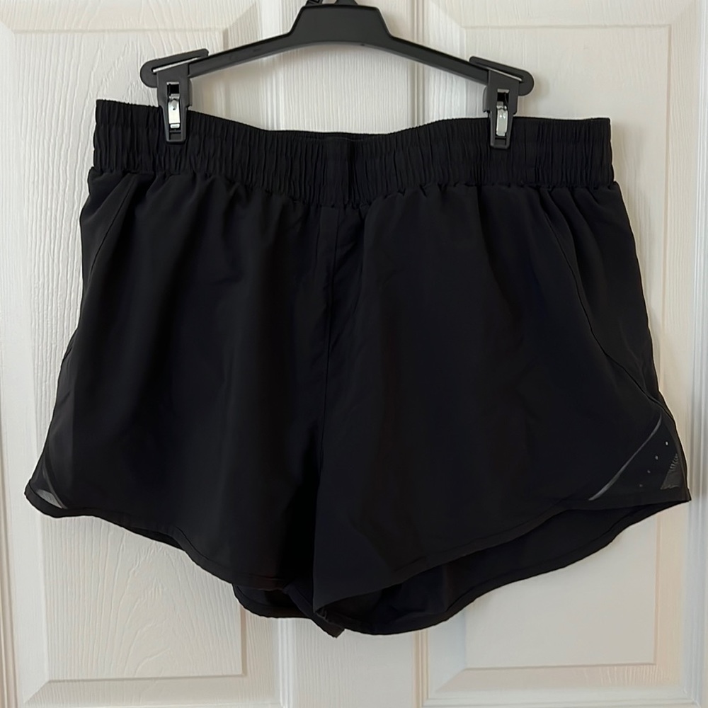 all in motion • black athletic shorts (L)